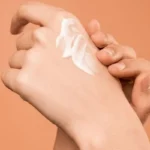 how to get tanning lotion off hands