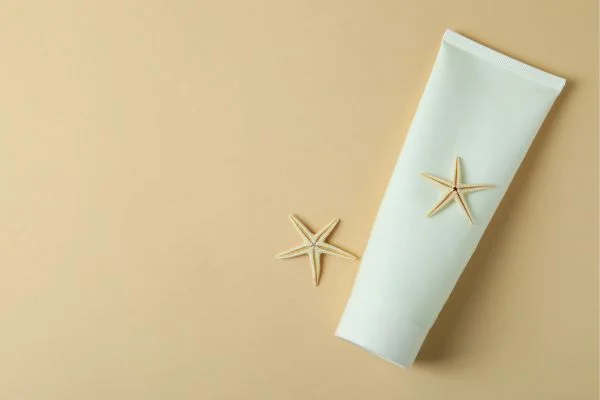 how to remove tanning lotion from hands