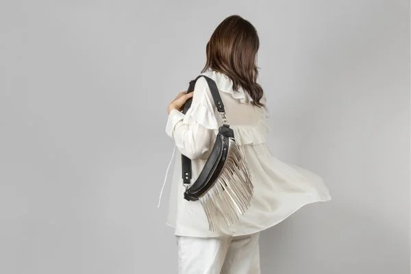 how to wear a fanny pack