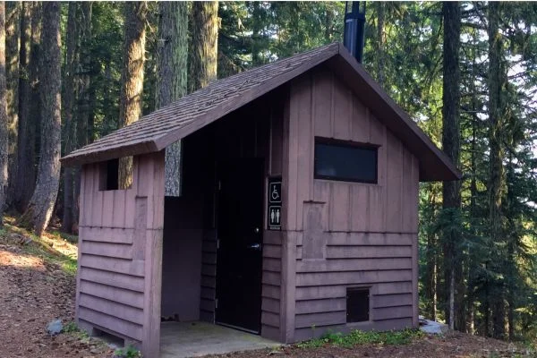 what is a vault toilet camping