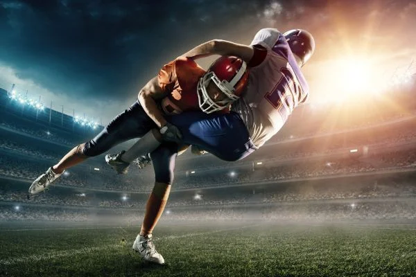 why do some football players wear fanny packs