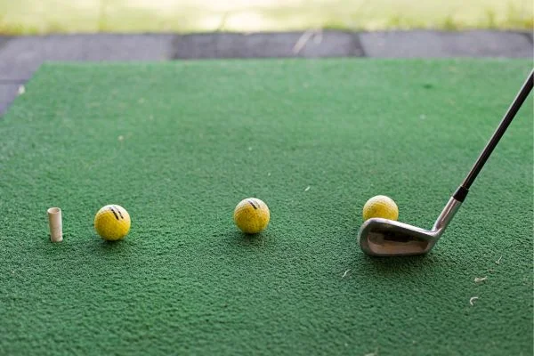 how to hit the golf ball straight