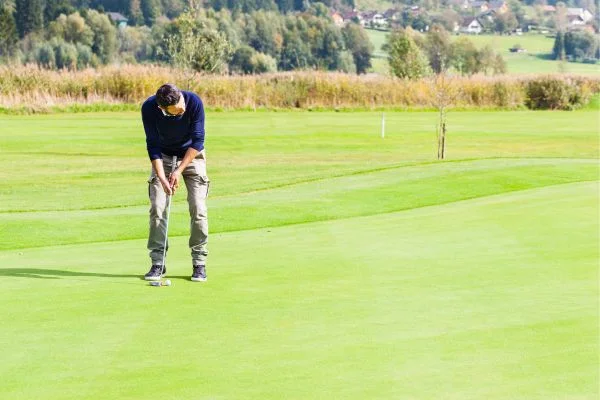 how to put backspin on a golf ball