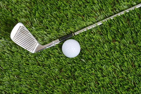 how to stop topping the golf ball